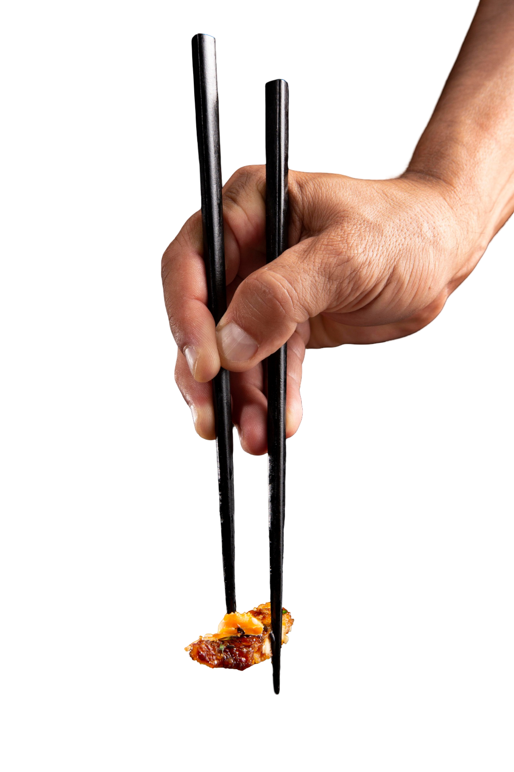 Hand holding sushi with chopsticks